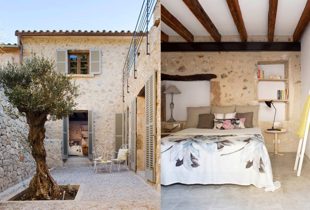 Patio mit Olivenbaum und grauen Fensterläden sowie Schlafzimmer mit Holzbalken und Steinmauer
