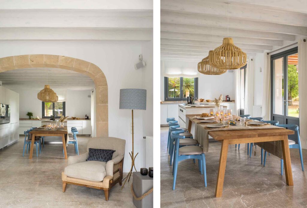 Comedor con arco de piedra, mesa de madera, sillas azules y lámparas de ratán, en dos vistas