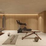 Render of the gym with weights, cardio machines, a bench and punch bags, with timber walls