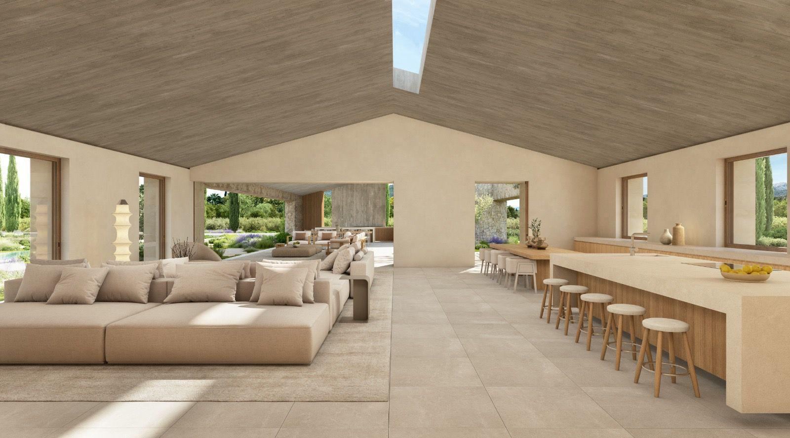 Render of the living room and kitchen with a long island and stools, opening onto the porch and garden