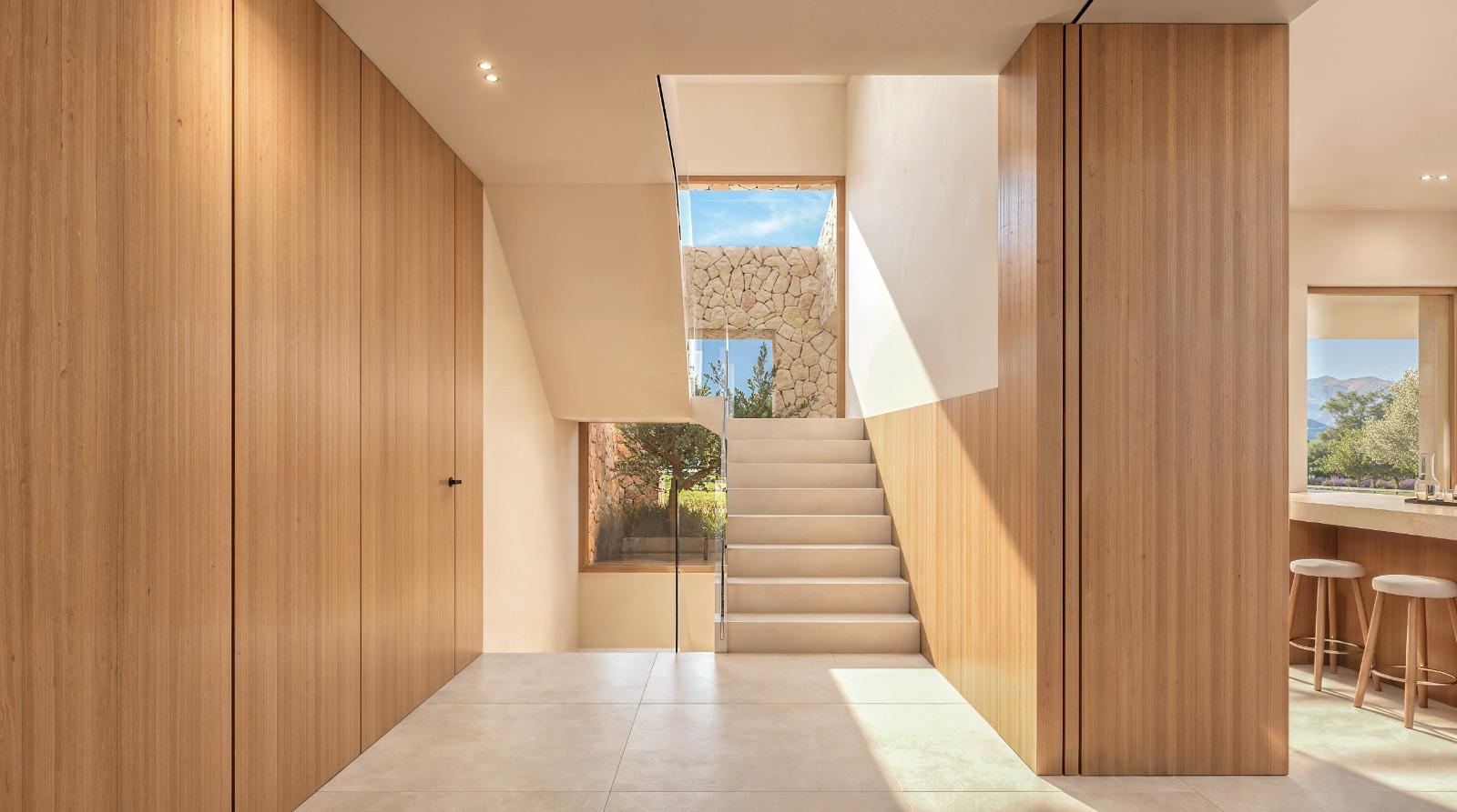 Render del vestíbulo de Can Melis con escalera, paneles de madera y luz natural